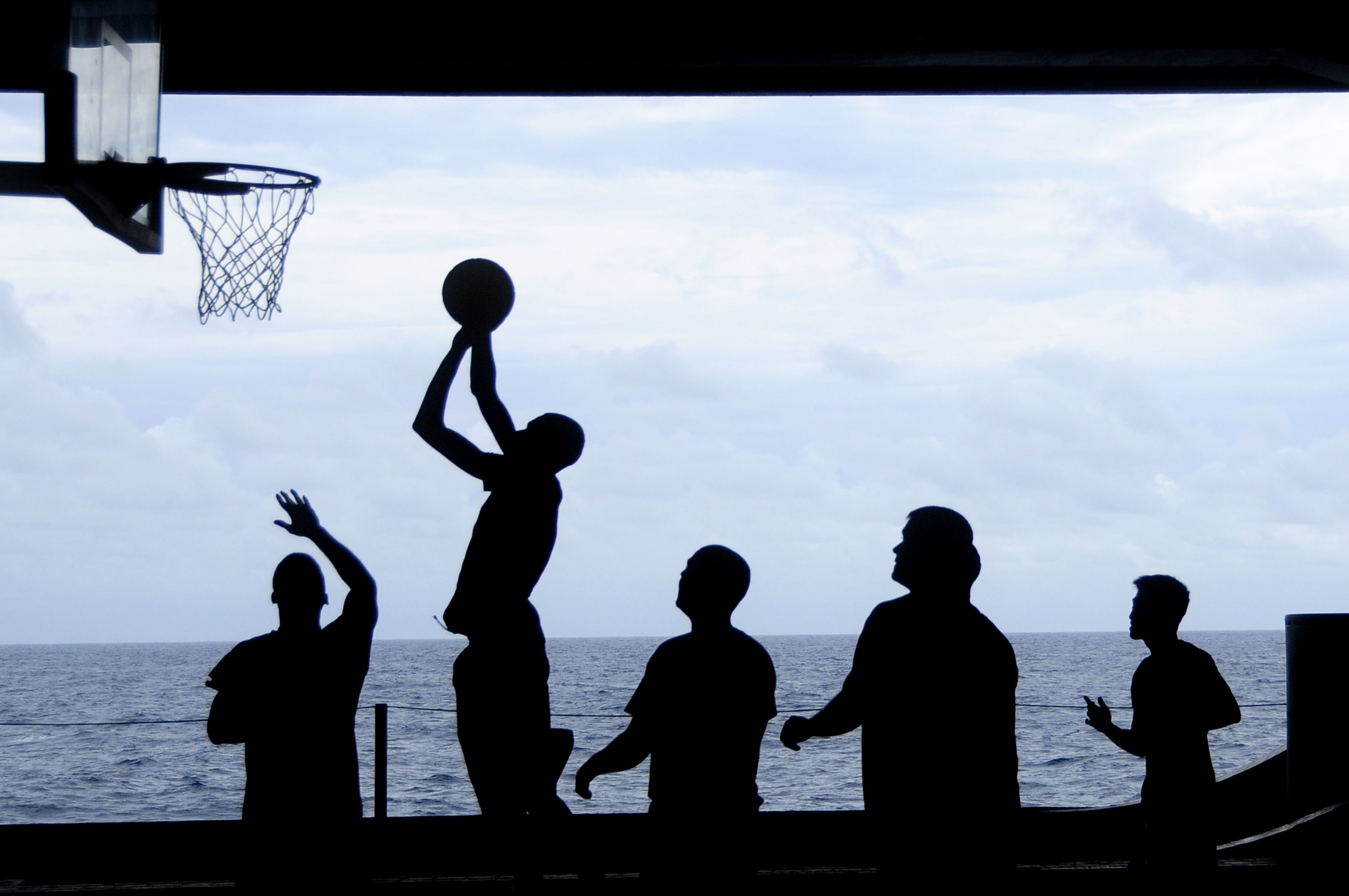 Silhouette of basketball players.